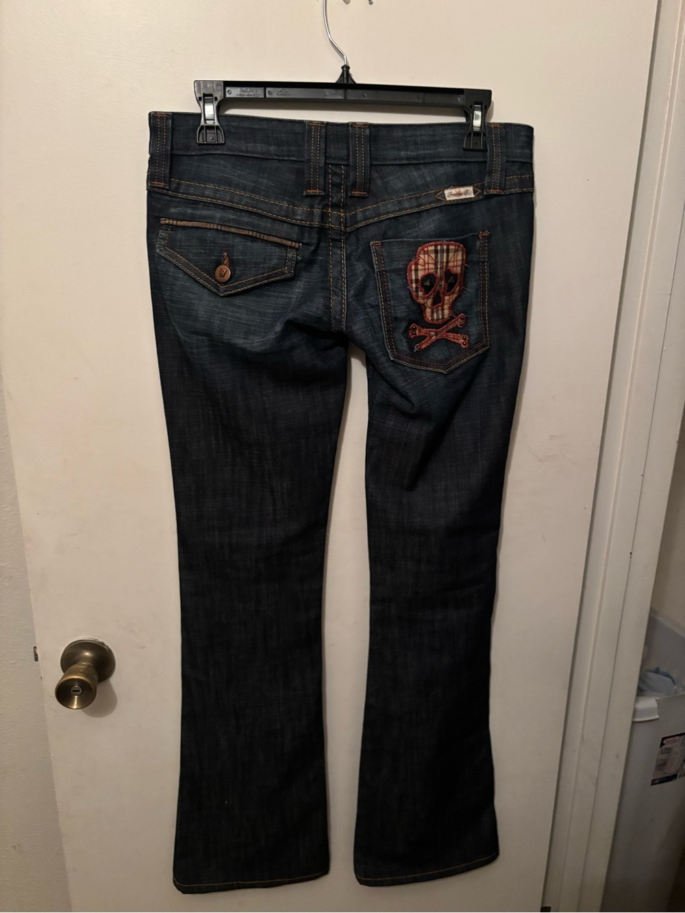 Frankie B. Dark Blue Bootcut Jeans with Skull Patch